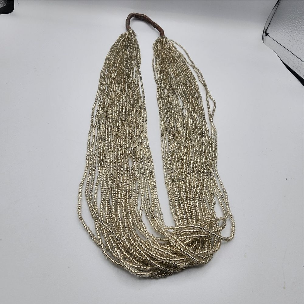 Fossil multistrand silver seed bead necklace